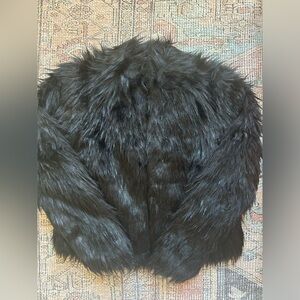 Black fake fur coat. Size small. Perfect condition. Tags attached.